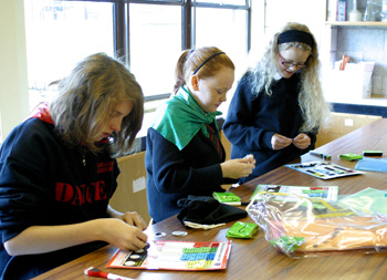 Kids taking part in Whose DNA workshop activity